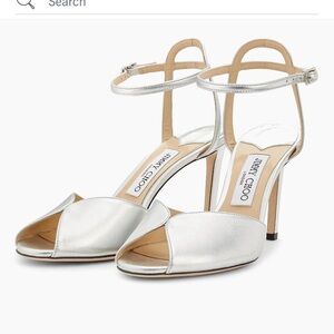 Jimmy Choo Silver metallic sandals.